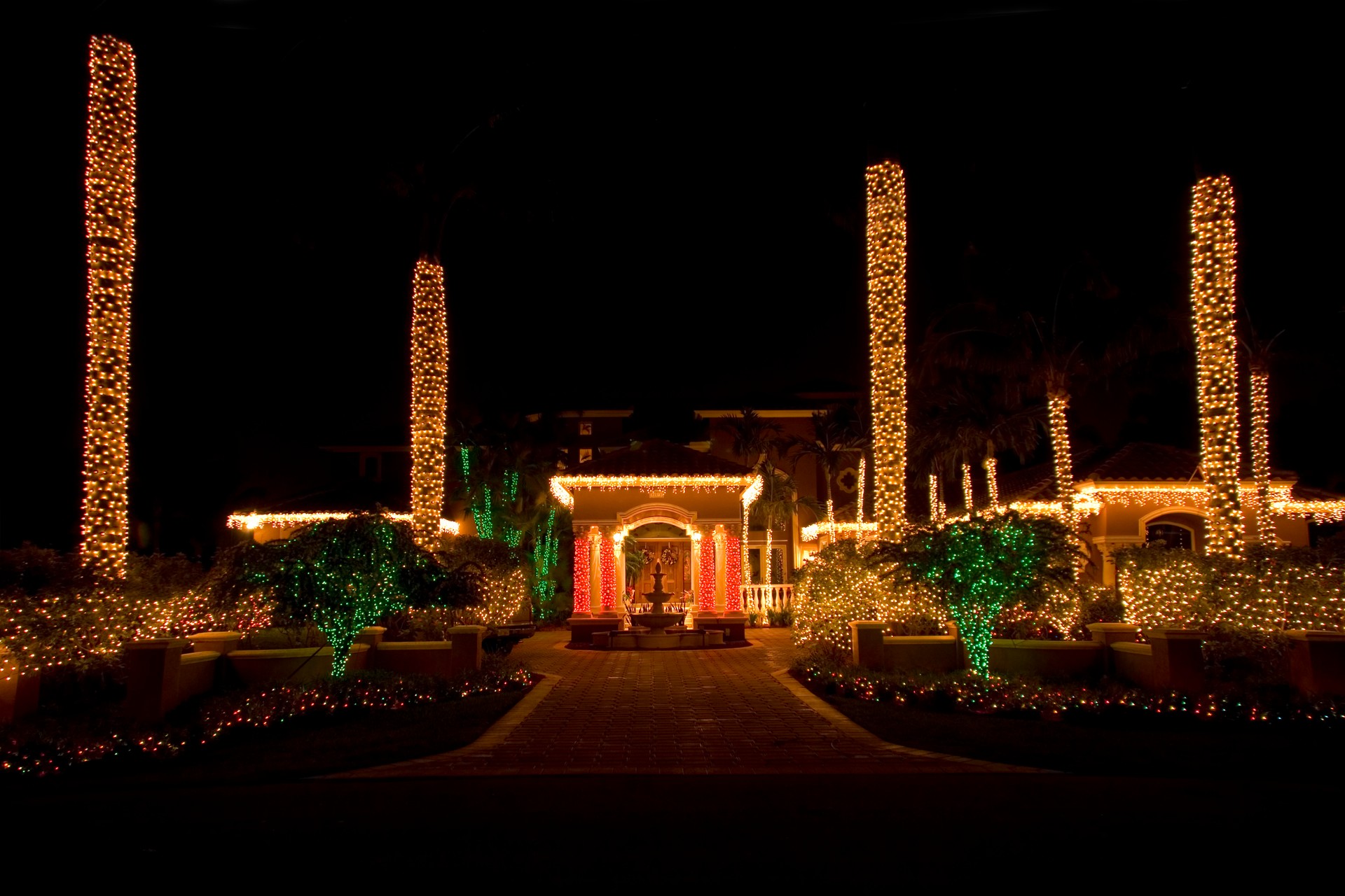 House extensively decorated with Christmas lights in Carlsbad, California